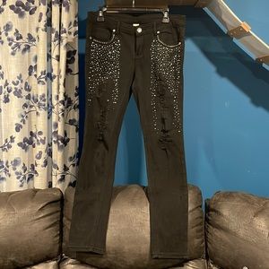 Black ripped jeans with rhinestone
